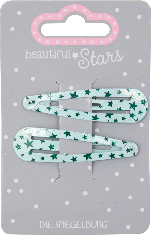 Zwei türkisfarbene Haarspangen mit grünen Sternen auf einer Karte mit der Aufschrift „Beautiful Stars“.