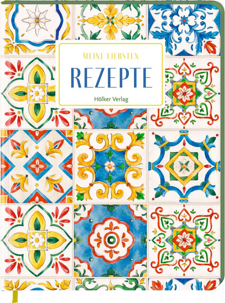 Notizbuch mit der Aufschrift „Meine liebsten Rezepte“, Umschlag mit buntem Fliesenmuster in Blau, Gelb, Grün und Rot.