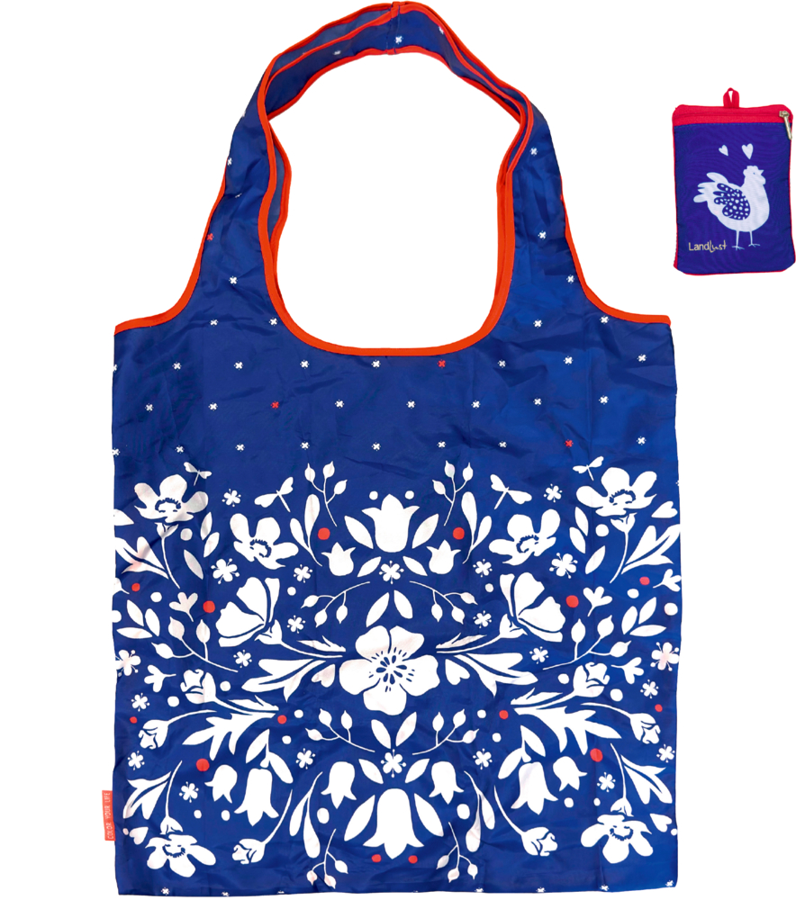 Blaue Stofftasche mit roter Umrandung und weißem Blumenmuster, daneben passendes Etui mit Huhnmotiv.