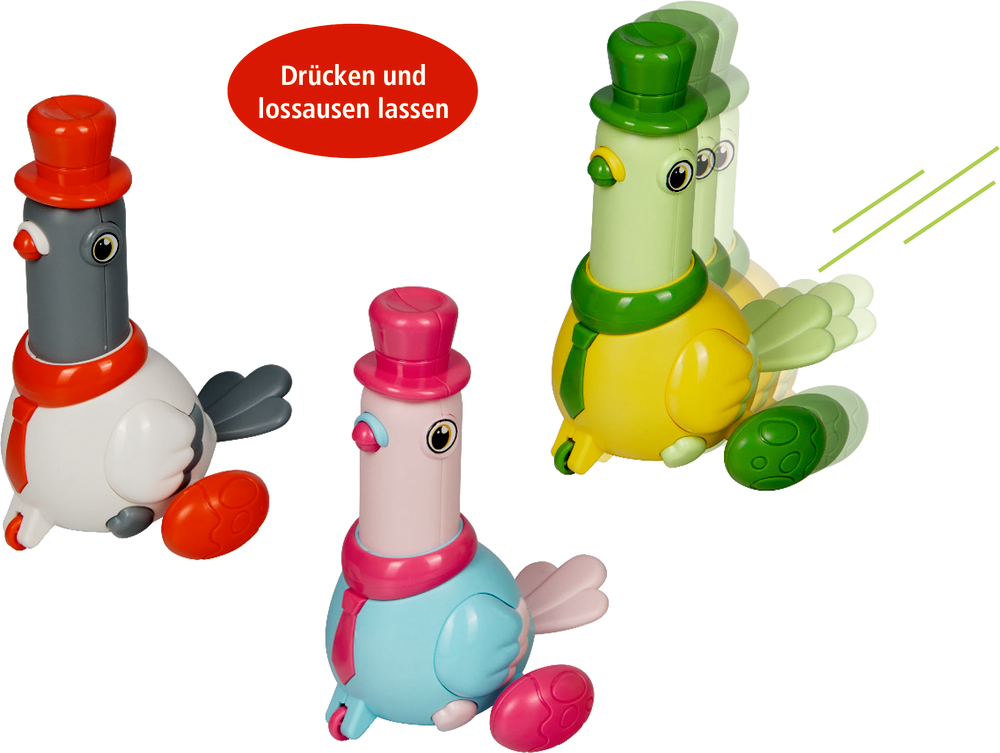 Drei bunte Aufziehvögel mit Hüten, einer bewegt sich; Text: Drücken und lossausen lassen.