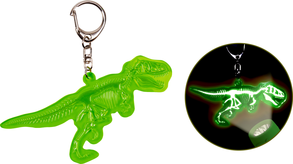 Im Dunkeln leuchtender grüner T-Rex-Dinosaurier-Schlüsselanhänger, beleuchtet in einem kreisförmigen Einsatz.
