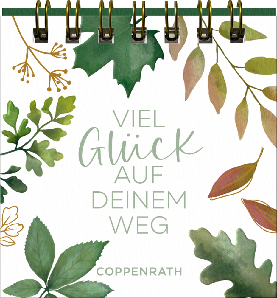 Spiralgebundeter Tischkalender mit grünem und goldenem Blattdekor und dem Text „Viel Glück auf deinem Weg“.