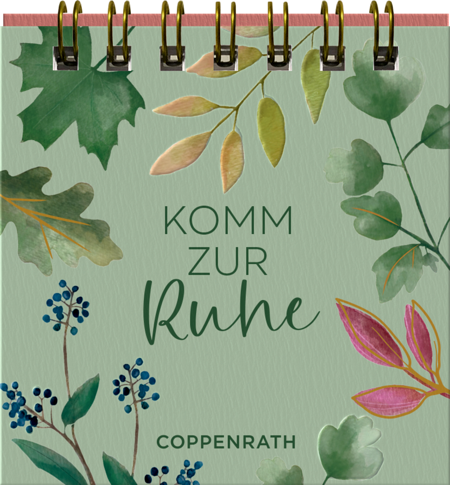Spiralgebundenes Buch mit grünem Einband, Blättern und Beerenillustrationen sowie dem Text „Komm zur Ruhe“.