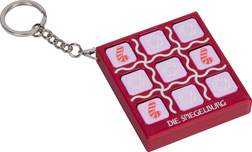 Roter Schlüsselanhänger mit kleinem Tic-Tac-Toe-Spiel, lila Felder mit Zuckerstangen- und Donutmuster.