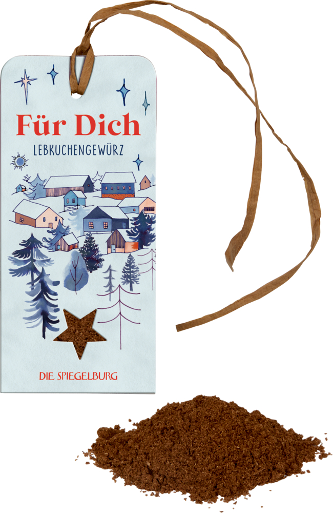 Geschenkanhänger im Winterdorf-Design mit Text und einer Prise braunem Gewürzpulver darunter.