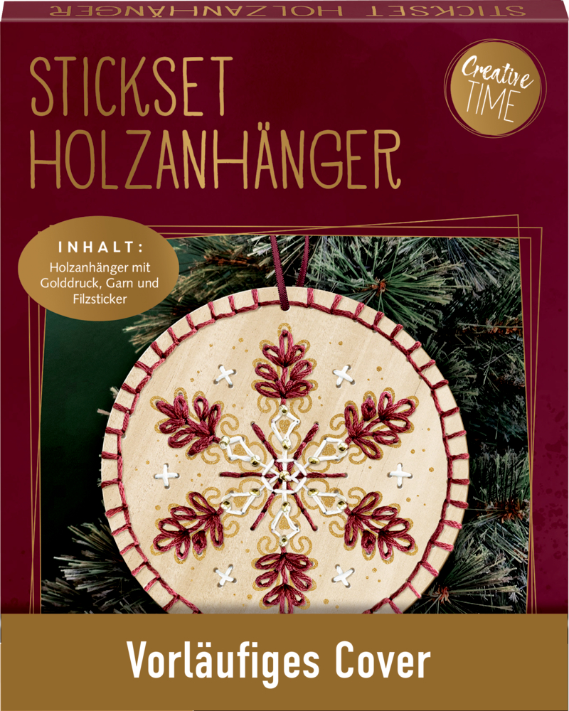 Stickset-Verpackung mit rundem besticktem Holzanhänger mit dunkelrotem und weißem Faden in Schneeflockenmuster.