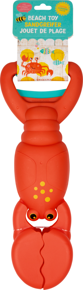 Rotes Strandspielzeug in Hummerform mit freundlichem Gesicht, verpackt mit buntem englisch-französischem Etikette.